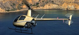 location hélicoptère - intérieur H125 avec sièges en cuir beige